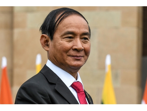 (Files) Myanmar's President Win Myint looks on during an official visit in New Delhi on February 27, 2020. (Photo by Prakash Singh / AFP)
