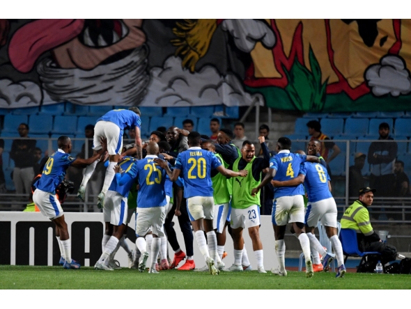 Sundowns' players celebrate after scoring their first goal during the CAF Champions League semi-final first leg football match between Esperance Sportive de Tunis (TUN) and Mamelodi Sundowns (RSA) at the Hammadi Agrebi Stadium in Rades on April 12, 2026. (Photo by FETHI BELAID / AFP)