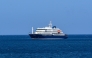 A general view of the cruise ship MV Hondius stationary off the port of Praia, the capital of Cape Verde, on May 3, 2025. Photo by AFP