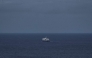 This general view shows the cruise ship MV Hondius, leaving the port of Praia, the capital of Cape Verde, on May 6, 2026. Photo by AFP