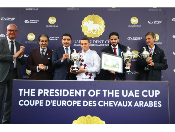 The connections of Lacaro Du Croate receive their awards after the Mansoor Khalil M. Al-Shahwani-owned mare won the President of the UAE Cup at ParisLongchamp yesterday.