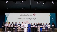 Officials with students during the ceremony. 