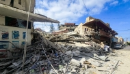 The rubble of a collapsed building is pictured following overnight Israeli bombardment on Lebanon's southern city of Tyre on May 16, 2026.
 (Photo by Kawnat Haju / AFP)