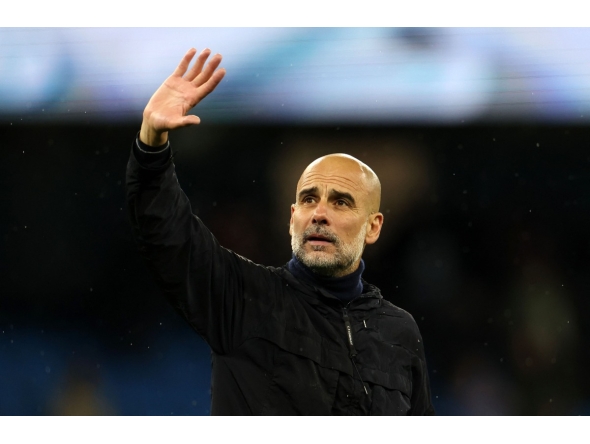 Manchester City's Spanish manager Pep Guardiola waves to the fans following the English Premier League football match between Manchester City and Crystal Palace at the Etihad Stadium in Manchester, north west England, on May 13, 2026. Photo by Darren Staples / AFP