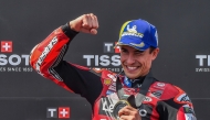 Team Ducati Lenovo Team's Marc Marquez celebrates winning the Sprint competition at the Balaton Park Circuit in Balatonfokajar, Hungary, on June 6, 2026, ahead of the Hungarian Motorcycle MotoGP Grand Prix. (Photo by FERENC ISZA / AFP)
