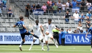 Qatar's Jassim Jaber (right) controls the ball during the match.