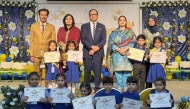 Principal PISQ Ch. Muhammad Afzal with officials and students during the event.