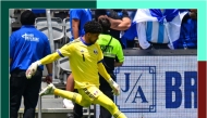 Qatar goalkeeper Mahmoud Abunada in action during the match against El Salvador on Saturday.  