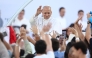 Pope Leo XIV greets the crowd as he arrives to attend a prayer vigil at the Lluis Companys Olympic Stadium in Barcelona, on June 9, 2026. (Photo by Josep Lago / AFP)