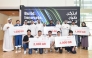 Officials and the prize winners during the event.