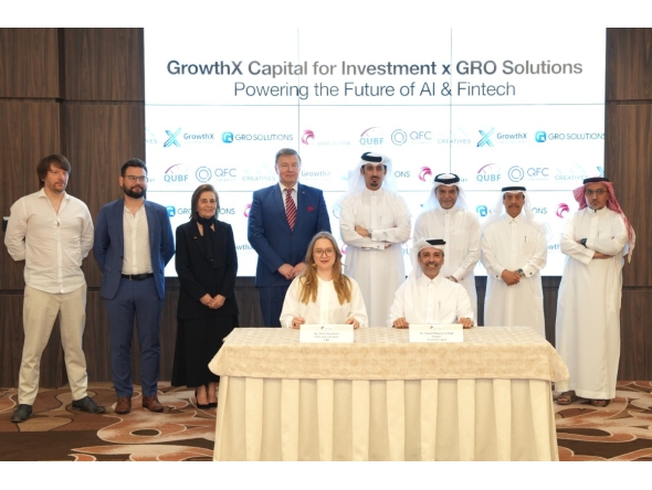 Ambassador of Ukraine to Qatar H E Andrii Kuzmenko and QC Board Member Mohamed bin Ahmed Al Obaidli with other officials witnessing the signing by Chairman of GrowthX Capital Hamad Mubarak Al Hajri and President of Grow Solutions Maria Shevchenko.