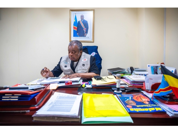 (Files) Professor Jean-Jacques Muyembe, director general of the National Institute for Biomedical Research (INRB), is seen at his office in Kinshasa, Democratic Republic of the Congo, on May 20, 2026. (Photo by Hardy Bope / AFP)