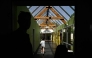 (Files) A child walks along the glass-roofed corridor of the Isle Verte primary school on May 28, 2026. (Photo by Philippe Lopez / AFP)