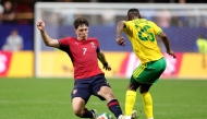 Ladislav Krejci #7 of Czechia competes for the ball against Kamogelo Sebelebele #25 of South Africa during the FIFA World Cup 2026 Group A match between Czechia and South Africa at Atlanta Stadium on June 18, 2026 in Atlanta, Georgia. (Photo by Alex Slitz / GETTY IMAGES NORTH AMERICA / Getty Images via AFP)
