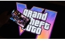 This illustration photo created in Los Angeles, December 4, 2023, shows Rockstar Games’ Grand Theft Auto VI trailer played on a screen in front of the game title. Photo by Chris DELMAS / AFP