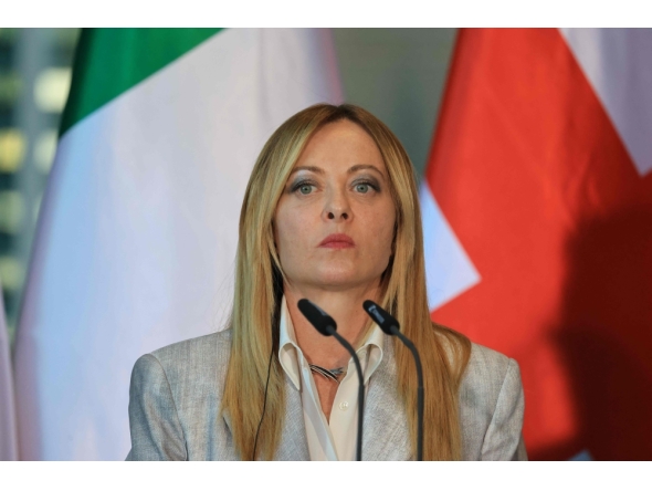 Italy's Prime Minister Giorgia Meloni addresses the press at the end of their meeting of state leaders of the European Group of Five (E5) and the NATO Secretary General, on June 24, 2026 at the Chancellery in Berlin, Germany. (Photo by Ludovic Marin / AFP)