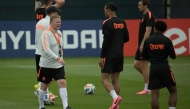 Netherlands' head coach Ronald Koeman (left) and Netherlands' defender Virgil van Dijk (centre) take part in a training session in Kansas City. PIC: AFP