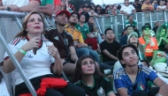 Football fans react at the FIFA Fan Fest during the 2026 FIFA World Cup football match between the Netherlands and Morocco at Parque Fundidora in Monterrey, Mexico, on June 29, 2026. (Photo by Julio Cesar Salazar / AFP)
 