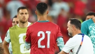 Portugal's forward #07 Cristiano Ronaldo wears a jersey with the number 21, used by late Portugal forward Diogo Jota. (Photo by Cole Burston / AFP)
 