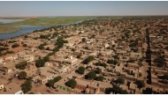 (FILES) An aerial image shows a general view of Gao, in Mali, on November 26, 2019.  (Photo by Souleymane AG ANARA / AFP)