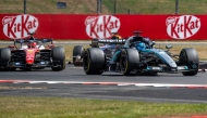 Mercedes' British driver George Russell (R) leads Ferrari's Monegasque driver Charles Leclerc (L) during the sprint race ahead of the Formula One British Grand Prix at the Silverstone motor racing circuit in Silverstone, central England, on July 4, 2026. (Photo by Andrej ISAKOVIC / AFP)