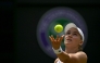 Kazakhstan's Elena Rybakina serves to Belgium's Elise Mertens during their women's singles third round tennis match on the sixth day of the 2026 Wimbledon Championships at The All England Lawn Tennis and Croquet Club in Wimbledon, southwest London, on July 4, 2026. (Photo by Glyn KIRK / AFP) 