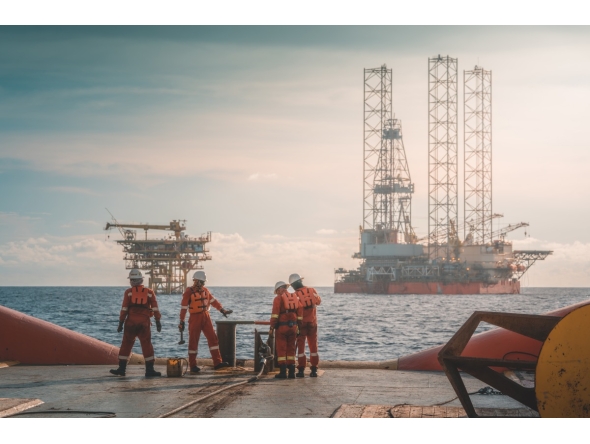 Anchor handling activity during rig move operation at oil field.