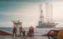 Anchor handling activity during rig move operation at oil field.