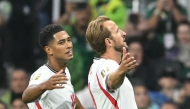 England's midfielder #10 Jude Bellingham (L) celebrates scoring his team's first goal with teammate forward #09 Harry Kane (R) at the Mexico City Stadium in Mexico City on July 5, 2026. (Photo by Yuri Cortez / AFP)
