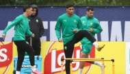 Morocco’s Bilal El Khannouss and Achraf Hakimi  (centre) take part in a training session. (PICS: AFP)