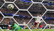 Spain's defender #12 Pedro Porro shoots and scores his team's second goal during the 2026 World Cup football tournament semi-final match between France and Spain at the Dallas Stadium in Arlington on July 14, 2026. (Photo by MAURO PIMENTEL / AFP)