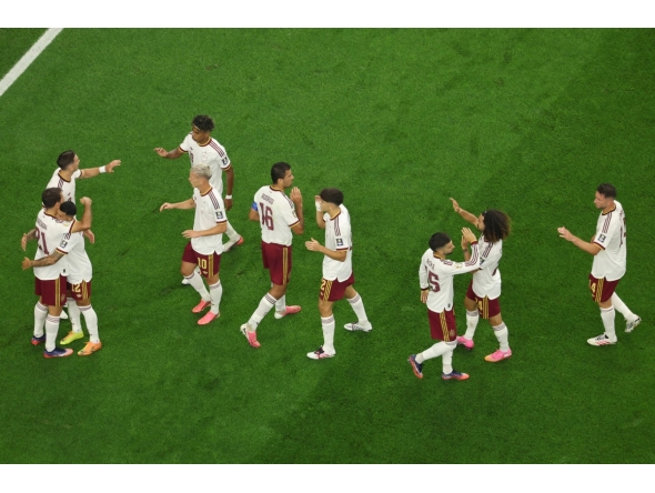 Spain’s players celebrate after Mikel Oyarzabal scored his team’s first goal during the semi-final against France on Tuesday. (AFP)