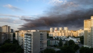 Smoke hangs in the air following Russian missile strikes on the Ukrainian capital of Kyiv on July 19, 2026, amid the Russian invasion in Ukraine. (Photo by Serhii Okunev / AFP)