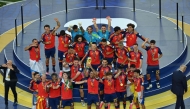Spain's midfielder #16 Rodri (front C) lifts the trophy with Spain's players next to Spain's head coach Luis de la Fuente (L) and US President Donald Trump (R) on July 19, 2026. (Photo by Angela Weiss / AFP)