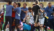 Argentina's midfielder #05 Leandro Paredes (top) clashes with Spain's midfielder #09 Gavi during the 2026 World Cup football tournament final match between Spain and Argentina at the New York/New Jersey Stadium in East Rutherford on July 19, 2026. (Photo by CHARLY TRIBALLEAU / AFP)