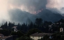 Flames spread on the hills surrounding Cotignac, southeastern France on July 23, 2026 during a wildfire. (Photo by Thibaud MORITZ / AFP)