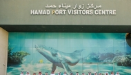 Officials and students at Hamad Port Visitors Centre. 