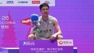 Taiwan's Chou Tien-chen poses on the podium at China Open badminton tournament in Changzhou, eastern China's Jiangsu province on July 26, 2026. (Photo by CN-STR / AFP)