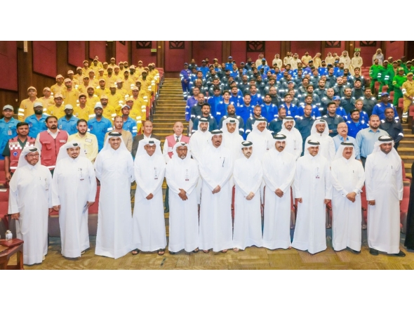 Officials with workers during the event.