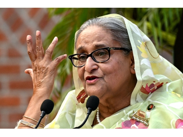 (Files) Bangladesh's Prime Minister Sheikh Hasina gestures while speaking to the media in Dhaka on January 8, 2024. (Photo by Indranil Mukherjee / AFP)