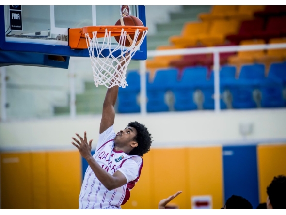 Qatar's Abdullah Yassin goes for a basket