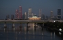 Buildings are seen behind a bridge over the Han River in Seoul on August 1, 2026. (Photo by Greg Baker / AFP)