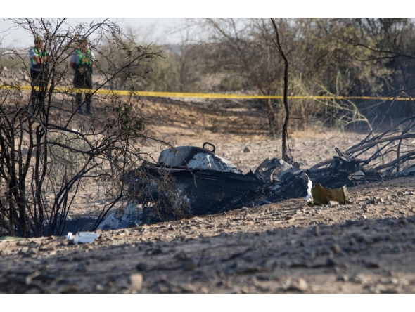 Wreckage of the small plane involved in a fatal accident that claimed the lives of its 13 occupants is pictured in the Vista Alegre district, Nazca, Peru, on August 1, 2026. Photo by Mariajulia VAREMAN / AFP