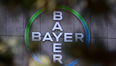 The company logo of German chemical giant Bayer is pictured at the company's site in Berlin on March 4, 2026. Photo by Tobias SCHWARZ / AFP