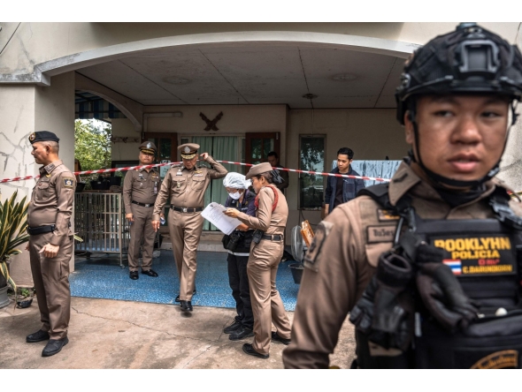 Police gather outside the house where a teenage suspect is suspected of killing his grandparents before carrying out a school shooting in Nonthaburi province, north of Thailand's capital Bangkok, on August 7, 2026. (Photo by Chanakarn LAOSARAKHAM / AFP)