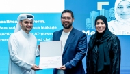 MCIT officials present a certificate to a programme participant.