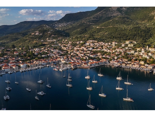 This photo taken on August 4, 2026, shows an aerial view of the town of Vathy on the island of Ithaca. Photo by Angelos TZORTZINIS / AFP