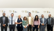 City University Qatar and Ulster University officials.