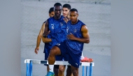 Al Duhail players attend a training session.