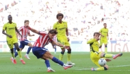 Atletico Madrid's Argentine forward #20 Giuliano Simeone kicks the ball during the Spanish league football match between Club Atletico de Madrid and Villarreal CF at Metropolitano Stadium in Madrid on August 23, 2026. (Photo by Pierre-Philippe MARCOU / AFP)